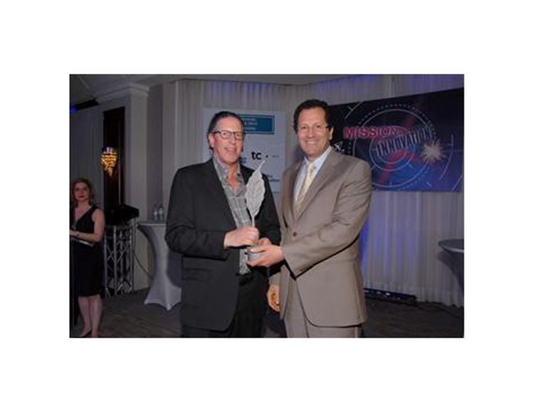 Fleurco’s president Robert Schachter in formal attire proudly receiving an award