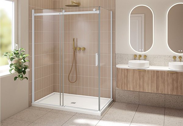 a matte white shower door in a bathroom featuring pastel colors, wooden vanities and brushed gold accessories.